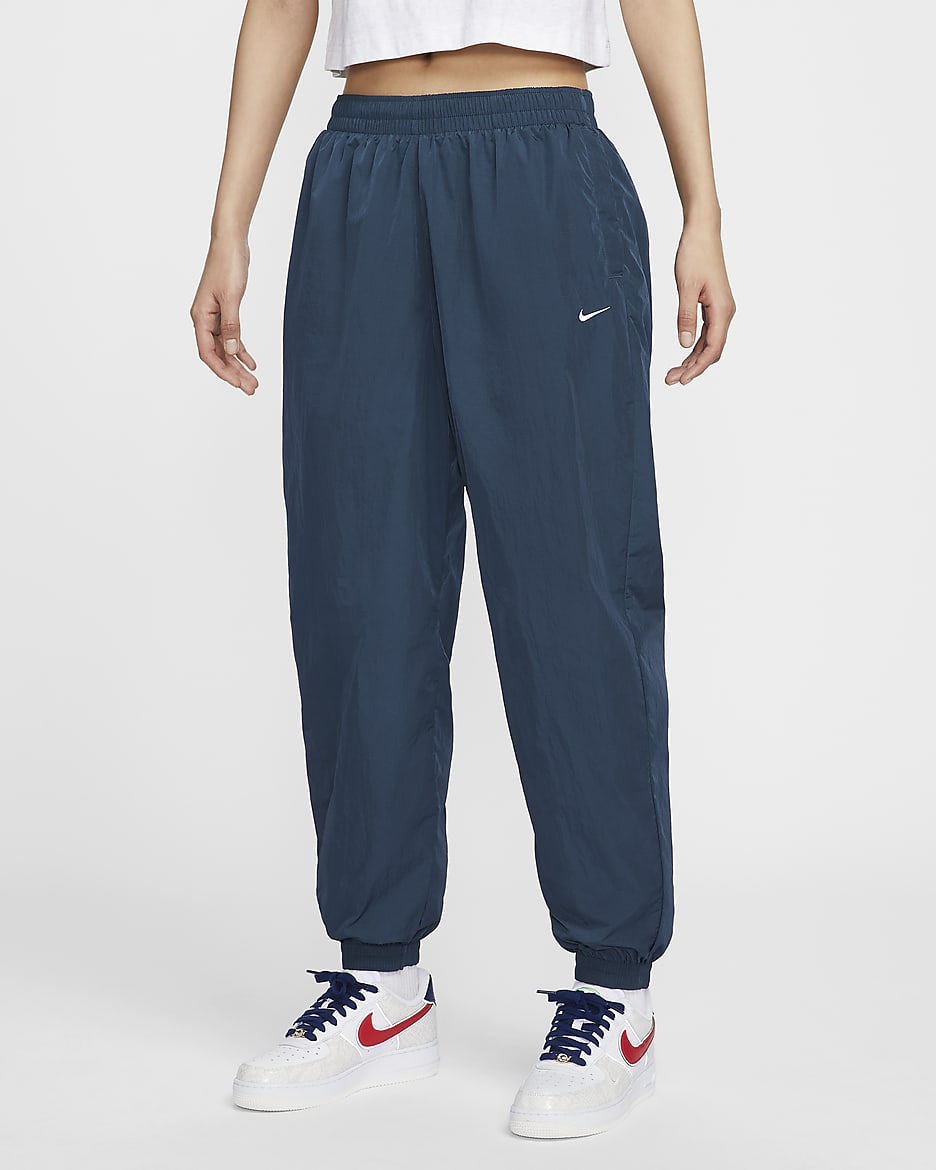 Nike Sportswear Essential Women s Mid Rise Oversized Woven Joggers. Nike ID